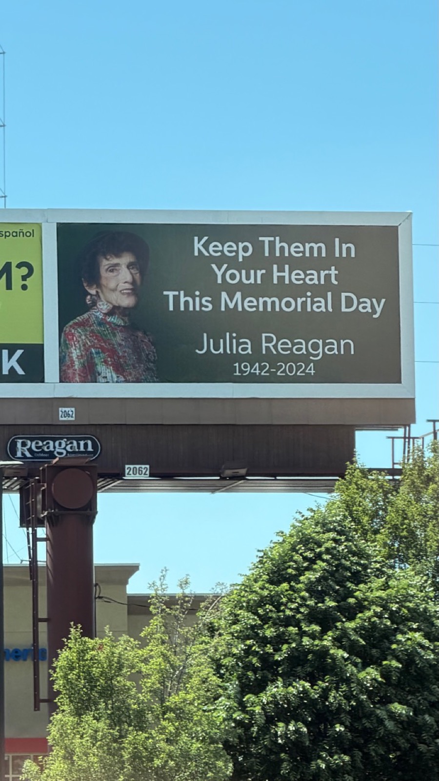 Julia Reagan billboard near Fort Union Boulevard